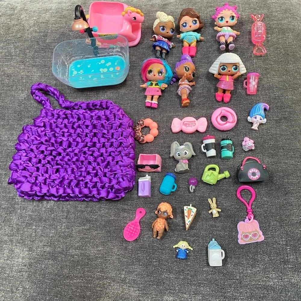 Six L.O.L Surprise dolls with 25 Piece Accessories!